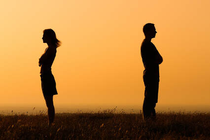 Individuals with their backs to each other, in the sunset. Couples counseling and sex therapy can help with your sexual performance anxiety. Learn from a Plymouth, MN sex therapist here. 55369 | 55361 | 55391