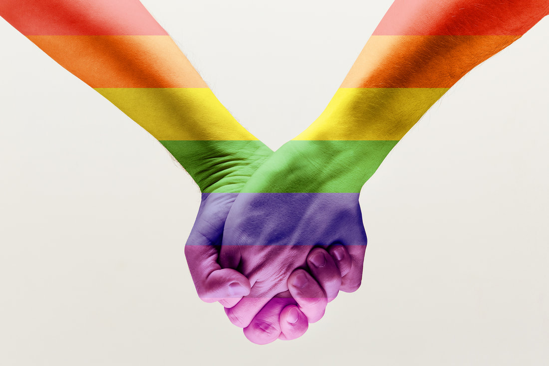 Picture of rainbow hands holding | LGBT Counseling | Polyamory Counseling | Plymouth, MN 55446