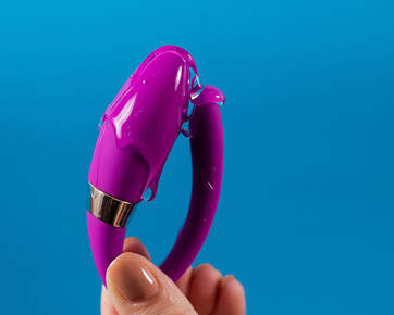 Clitoral stimulation vibrator covered in lube. Lube is gaining in popularity lately and a Plymouth, MN sex and relationship therapist can help. Read on for help in Plymouth, MN 55447 | 55441 | 55442