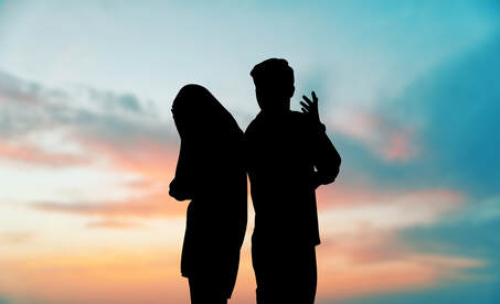 Couple in shadow in the sunset. You can get help for infidelity with marriage counseling in Minneapolis, MN with a Plymouth, MN sex therapist trained in Gottman marriage counseling and couples therapy for online therapy in Minnesota.