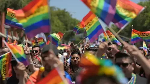 Pride flags with a festival or parade. Learn from a lgbt therapist Plymouth, MN for inclusive and LGBTQ friendly sex therapy in Minnesota. Online therapy in Minnesota can help you!