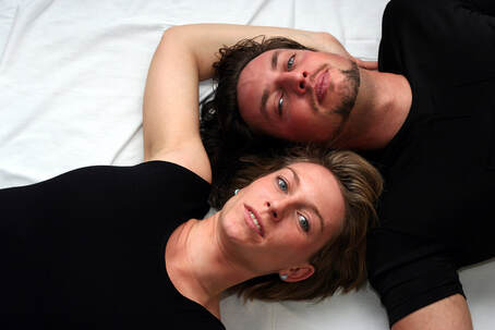 Couple laying on bed looking up at the camera. Couples considering BDSM or Kink for the first time may want to discuss with a skilled sex therapist or mental health professional first. For sex therapy in Plymouth, MN or online sex therapy in Minnesota consider a sex therapist near Minneapolis. 55369 | 55361 | 55391